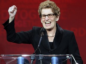 Liberal leadership candidate Kathleen Wynne celebrates becoming the next premier of Ontario after the third ballot at the Liberal Leadership convention in Toronto.