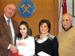 The new weather balloon launch facility built near the city's airport will be named the Timmins Stratospheric Balloon Base. École catholique Anicet-Morin Grade 6 student Kirsten Chartrand came up with the name, which was just one of 89 suggestions in a contest put on by Science Timmins. Test balloon launches by the Canadian Space Agency (CSA) and the French Centre national des études spatiales (CNES) will begin as early as this summer. Pictured at Monday's city council meeting are, from left, Mayor Tom Laughren, Chartrand, École Anicet-Morin principal Michelle Dubeau, and Science Timmins president Antoine Garwah.