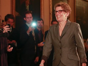 Newly elected Ontario Premier Kathleen Wynne meets with outgoing premier Dalton McGuint at Queens Park in Toronto on Jan. 28, 2013. (Dave Thomas/QMI Agency)