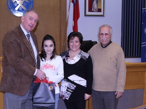 Timmins Mayor Tom Laughren, left, was one of the first Monday night to congratulate young Kirsten Chartrand of Ecole Anicet Morin. The Grade 6 student won the contest to name the new Timmins Stratospheric Balloon Base. Also on hand for the presentation was Anicet Morin principal Michelle Dubeau and Science Timmins president Antoine Garwah.  Timmins Times LOCAL NEWS photo by Len Gillis.