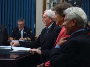 From left, Gerry Benson, Gail Kaneb and Tom Kaneb present their proposal for a local university to city councillors.