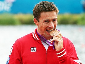 Canadian canoeist Mark Oldershaw, shown with his bronze medal from the 2012 Olympic Games, Wednesday was chosen flag bearer for the Canadian delegation at the Pan Am Games opening ceremonies Friday, July 10, in Toronto. FILE PHOTO