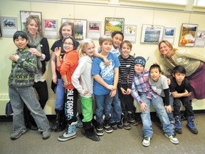 Photographer Tammy Hanratty and Right From the Start wellness mentor Kat Wiebe join 10 Grade 5 students at the opening reception for I’ll Show you My World, Exploring and Expressing Self at Town Hall on Monday, Jan. 28. The show is up until Friday, Feb. 22. and can be viewed during regular businesses hours at Town Hall. Corrie DiManno/ Banff Crag & Canyon
