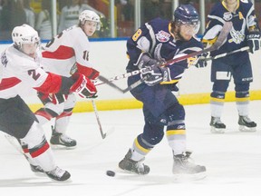 Canmore Eagles forward Alexander Bechtold keeps his eye on the puck as he looks for a goal against the Camrose Kodiaks Friday, Jan. 25. Canmore won 4-3. Justin Parsons/ Banff Crag & Canyon