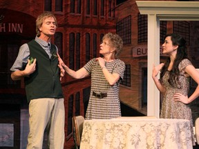 Matt Evans, Carroll Flood and Leanne Henrich, right, rehearsing a scene from the Owen Sound Little Theatre’s production of Kiss the Moon, Kiss the Sun, which begins its run Thursday at the Roxy Theatre in Owen Sound.