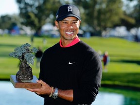 On Monday, Tiger Woods won the Farmers Insurance Open, a victory that has in the past pointed the way toward a successful season. (Reuters)