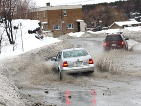 Bellevue near Minnow Lake in Sudbury is flooded. JOHN LAPPA/THE SUDBURY STAR/QMI AGENCY