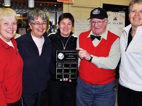 The O'Donnell Rink from Lakefield captured the KM Construction Trophy last week at the Marmora and Area Ladies Invitational Bonspiel. From left are, lead Jan Dutcher, vice Jayne Gilhuly, award presenter Joe Maloney, skip Helen OíDonnell and second Lois Cole.