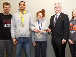 Allan Faulds, Leaugen Fray, Rachel Faulds, Quinte West Mayor John Williams, Sue Tripp and Duncan Armstrong are seen here at city hall Monday afternoon promoting the newly formed Quinte West Track Club.