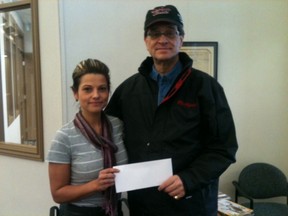 Dave Andrewsky receiving cheque from C-Ann Pohr