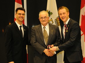 Jim Dechant presented with the QE II Diamond Jubilee medal by MP Chris Warkentin (right) and Grande Prairie Mayor Bill Given (left)