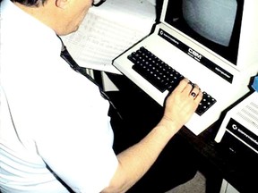 Gord Clauws, in the early 1980s, working on a compugraphic computer at Leader Publications Ltd. (Submitted Photo)