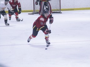 Airdrie Thunder forward Donovan Henrion brings the puck up the ice against the Coaldale Copperheads at the Ron Ebbesen Arena on Friday night. Henrion’s girlfriend is Jenna Smith, the second-leading scorer with the University of Calgary Dinos women’s hockey team.
CHRIS SIMNETT/AIRDRIE ECHO