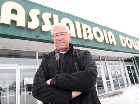 Harvey Warner, president of the Manitoba Jockey Club, stands outside Assiniboia Downs in Winnipeg, Man. Wednesday Jan. 30, 2013. Warner is not happy about a proposal from the Red River Exhibition Association to take over the track. (BRIAN DONOGH/WINNIPEG SUN)