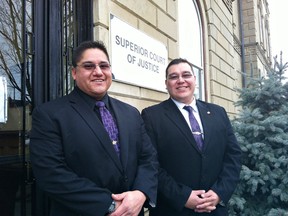 SUSAN GAMBLE, The Expositor

Sgt. Tim Bomberry (left) and Const. Marwood White of Six Nations police celebrate a not guilty verdict Wednesday.