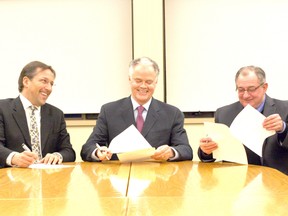 From left, Parkland County Mayor Rod Shaigec, Spruce Grove Mayor Stuart Houston, and former Stony Plain Mayor Ken Lemke signed an agreement in 2011 that binded the three municipalities together for the funding of three new fire fighting apparatuses. Shaigec said he is planning to seek another term serving with Parkland County in the upcoming fall municipal election.
