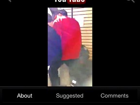 Nisar Mohammad, 45, came between two boys inside the lounge at Square Boy Pizza in Chatham as seen in this screen capture of a video posted on YouTube showing one boy punching and kneeing the other youth on Jan. 24.