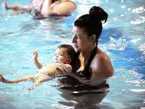SARAH DOKTOR Simcoe Reformer
Jaime Borden and 10-month-old Presley Cooper take part in the Red Cross Swim Pre-School lessons at the Annaleise Carr Aquatic Centre on Jan. 16.
