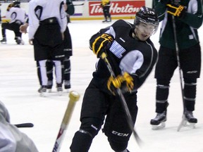 Reid Boucher rips a one timer at goaltender Ryan Hergott during Sarnia Sting practice on Wednesday, Jan. 30, 2013. PAUL OWEN/THE OBSERVER/QMI AGENCY.