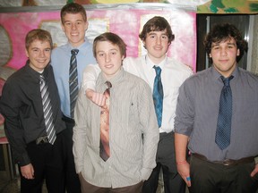 SARAH DOKTOR Simcoe Reformer
Former Port Dover Composite School students attended the final semi-formal dance in the school's gym on Jan. 31. From left to right, Jacob Wilson, Braeden Sowden, Sean Cowan, Sawyer Thompson and Gabriel Acuna mingled in the hallway during the dance.