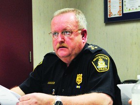 Brockville Police Chief John Gardiner is reflected in the boardroom table as he speaks to the Brockville police services board in this file photo.