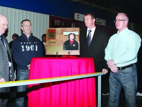 Pembroke Lumber Kings Wall of Honour inductee Art Gallagher (third from left) was joined by (from left) Nelson and Tyler Morris, Mitch Brideau, Pat Deloughery and Robb Wilson as his plaque was unveiled during a recent Kings' home game.