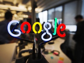 A neon Google logo is seen at the new Google office in Toronto, Nov. 13, 2012.    REUTERS/Mark Blinch