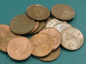 Starting on Feb. 4 pennies will start to disappear as the Royal Canadian Mint will no longer be distributing the copper plated coin. Folks paying in cash will then have to start thinking about rounding up to the nearest five cent increment. (FILE PHOTO)