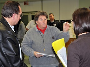 Asphodel-Norwood resident and anti-wind turbine activist Debbie Lynch debates Thursday in Norwood with Collie Hill Wind Farm project manager Bill York and renewable energy consultant Katie Meyer-Beck.