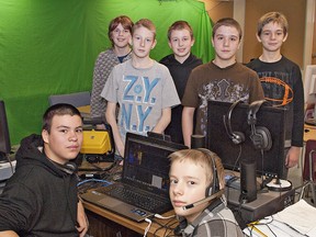 Young broadcasters (seated from left) Preston Montour and Robert Vrolyk, and (standing, from left) Austin McGee, Braden Bond, Josh Clucas, Ben Didomizio and Nicolas Miller take part in a daily morning announcements video broadcast to the student body at Grandview Public School on North Park Street in Brantford. (BRIAN THOMPSON The Expositor)