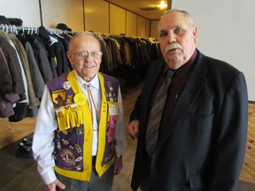 Ron Canton, left, a charter member of the Wyoming Lions Club, is greeted Saturday by Plympton-Wyoming Mayor Lonny Napper at a community appreciation awards luncheon in Camlachie. Napper hosts the luncheon each year to honour individuals and groups for their contributions to the community. PAUL MORDEN/THE OBSERVER/QMI AGENCY