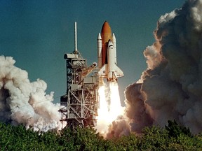 File photo showing the space shuttle Columbia during lift-off from the Kennedy Space Center in Cape Canaveral, Florida January 16, 2003. Columbia carried a crew of seven, including Ilan Ramon, the first Israeli to travel on the space shuttle during it's 16-day and final mission. February 1, 2013 marks the 10th anniversary since the orbiter broke apart in the skies over Texas, killing the crew of seven astronauts. Columbia broke up as it re-entered the atmosphere because of damage to the leading edge of the left wing.  REUTERS/Karl Ronstrom/Files