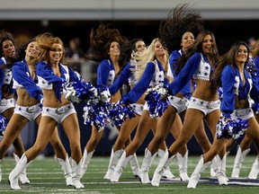 The Dallas Cowboys Cheerleaders, seen here before a game late last year, will perform at NFL Canada's Super Bowl party in Toronto Sunday. (Tom Pennington/Getty Images/AFP)