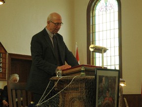 Pastor Tom Jeffery leads members and guests of St. John's Presbyterian Church through the annual Blessing of the Nets service Sunday in Port Stanley. The service has been a tradition at the church since 1954 and is a way to pray for area fisherman during fishing season for safe travels and good catches. NICK LYPACZEWSKI/ TIMES JOURNAL/ QMI AGENCY