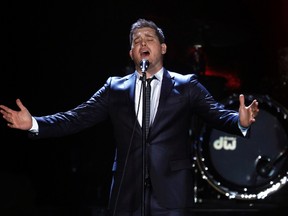 Canadian singer Michael Buble performs at Luna Park stadium in Buenos Aires March 24, 2012. (REUTERS/Marcos Brindicci)
