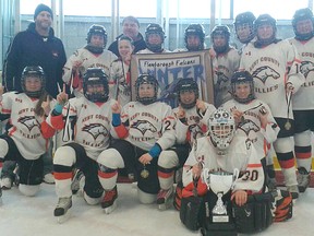 The Kent County Fillies Peewee 'B' hockey team outscored their opponents 16-3 and posted three shutouts to win all five games the weekend of Feb. 2 and 3 as they won the first annual Flamborough Falcons Winter Chill Tournament. Bottom row: Hailey Johnson, Brooke Anderson, Kara Coleman, Brook-Lyn Phelan, goaltender Marandee Hunter, Kelsea Ellis. Top row: head coach Shawn Simpson, Mckenzie Wilson, Bailey Stewart, assistant coach Bruce McFarlane, Brittany Goodhand, Randi-Renee Spotton, Megan Hakr, Ryanne Logan, Jessica Roelofs, Lauren Kelly, assistant coach Mike Hakr.