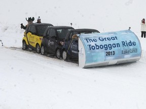 After breaking the record for riding the largest toboggan built to scale, the college decided to let their campus security smart cars have a ride as well.