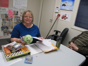 Patty Lakeman, Fallen Four Memorial Society board secretary works on planning for the kids’ carnival the society will be holding at Mayerthorpe Diamond Centre on the afternoon of Saturday, March 2.