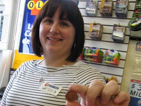 DANIEL R. PEARCE  Simcoe Reformer
Becky Osborn, assistant manager of the Target convenience store and gas bar on Queensway West in Simcoe, says people often use a penny to scratch lottery tickets. The coin is gradually being taken out of circulation.