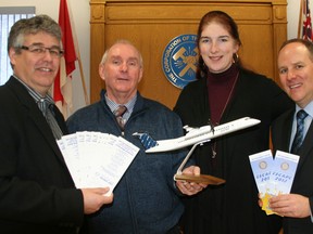 Timmins Mayor Tom Laughren, second from left, is a previous top prize winner of the Rotary Club’s annual Escape draw. Two years ago, Laughren won the Dream Destination prize and used it to go on a trip for two to Jamaica. He was present Monday as Ross MacIvor, co-chairman of the Escape 2013 committee, from left, Christina Geddes, president of the Rotary Club of Timmins Porcupine, and Darren Taylor, co-chairman of the Escape 2013 committee, were promoting this year’s draw taking place at Kamiskotia Snow Resort on Feb. 23.