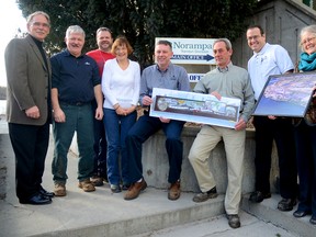 Dave Shoniker, with Norampac staff Gerald Nolin, Chris Clark, Audrey Wood, general manager Mike MacNeil, purchasing officer Don Tomlin and Sylvain Fillion, along with Wendy Ouellette, are shown here Friday at Norampac. The plant recently made a donation to the Trent Port Photo Mosaic Mural Project. 
Emily Mountney/Trentonian/QMI Agency