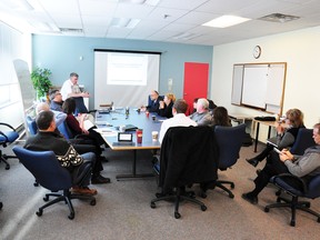 Ian Duff, consultant with McSweeney and Associates, standing, talks with count business representatives, municipal staff and elected officials about the potential and forecasted economic impact of an expanded Highway 17 at a meeting on Friday morning. For more community photos please visit our website photo gallery at www.thedailyobserver.ca.