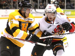 Kingston Frontenacs defenceman Mikko Vainonen battles with Belleville Bulls’ Tyler Graovac during an Ontario Hockey League game at the K-Rock Centre on Jan. 11. Later in the game, Vainonen was ejected for checking a Bulls player in the head and received a 10-game suspension. Vainonen returns from the suspension Wednesday night in Mississauga. (Whig-Standard file photo)