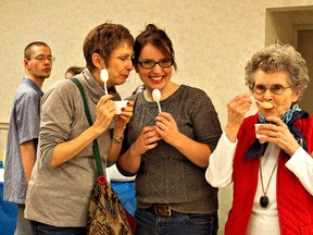 KARA WILSON, for The Expositor

Susan Rutherford, Rebekah Pitts and Joyce Swackhumer enjoy a bowl of spiced sweet potato soup during the eighth annual Soup Challenge on Tuesday night that is part of Youth Homelessness Week events.