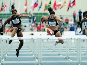 Canadian hurdler Priscilla Lopes-Schleip, centre, was among the elite athletes competing at last year’s Donovan Bailey Invitational at Foote Field. The annual meet goes back to its original Edmonton International title this year.