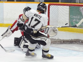 Rushnell Funeral Centre Quinte West Major Bantam Hawks' Andrew White beats Ajax Knights' goalie Zachary Zwarych during the Hawks' 6-3 Ontario Minor Hockey Association win Sunday at the Community Gardens.