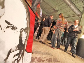 An image of Apple co-founder Steve Jobs by Kitchener artist Jennifer Gough was a perfect backdrop for the discussion at Factory 163 Tuesday night about the intersection of art and technology. (MIKE BEITZ The Beacon Herald)