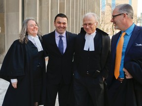 Boris Petkovic, second from the left, outside of the courthouse at 361 University Ave. on Feb. 6, 2013 just after being acquitted for aggravated assault. Petkovic is flanked by his lawyers, Joanne Mulcahy and Harry Black and on the far right is Mike McCormack, president of Toronto Police Association. (Ernest Doroszuk/Toronto Sun)