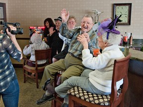 BRIAN THOMPSON, The Expositor

Videographer Stephanie Gash tapes Seasons Bell Lane residents, including Don Howarth and Norma Dick, having a good time on Wednesday for a video.