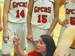 Head coach Cherish Esau (in orange) has the Grande Prairie Composite Totems playing some of the best basketball the school has seen in recent years.  (TERRY FARRELL/DAILY HERALD-TRIBUNE)